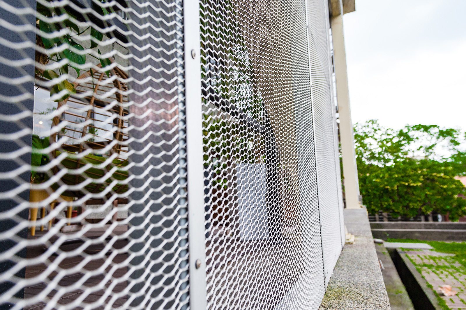 屏科大圖書館｜外牆過渡空間、節能通透與防鳥設計